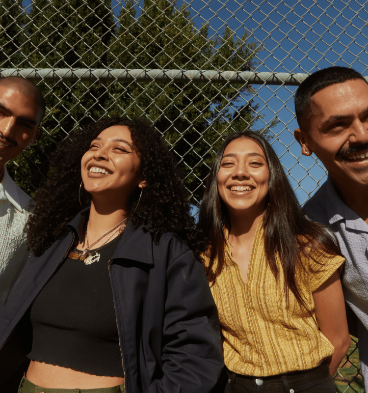Group of friends talking in a park - Insurance consultation concept - Health Insurance Advice